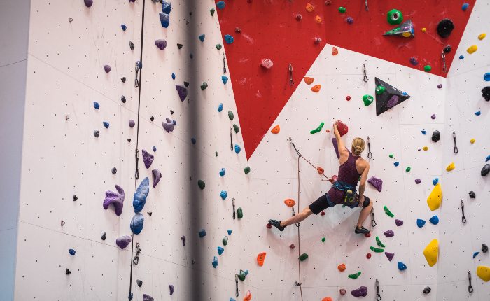 Women lead climbing indoors