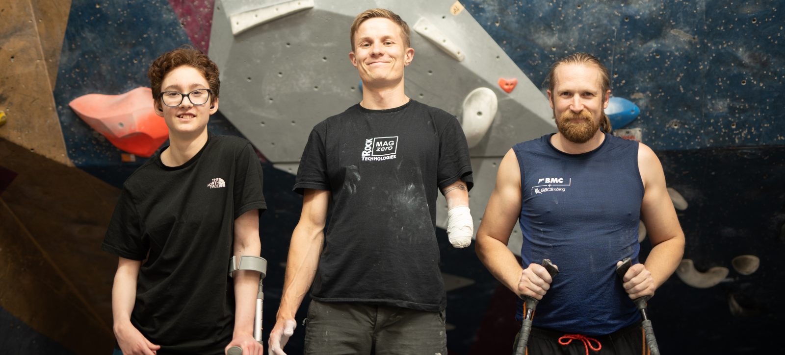 3 members of the paraclimbing social stand for a group shot.