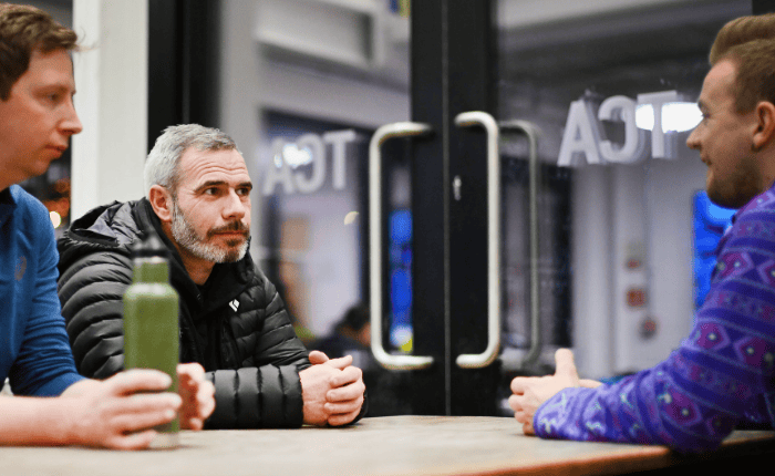 The mean meet for a coffee and catch up before the climb