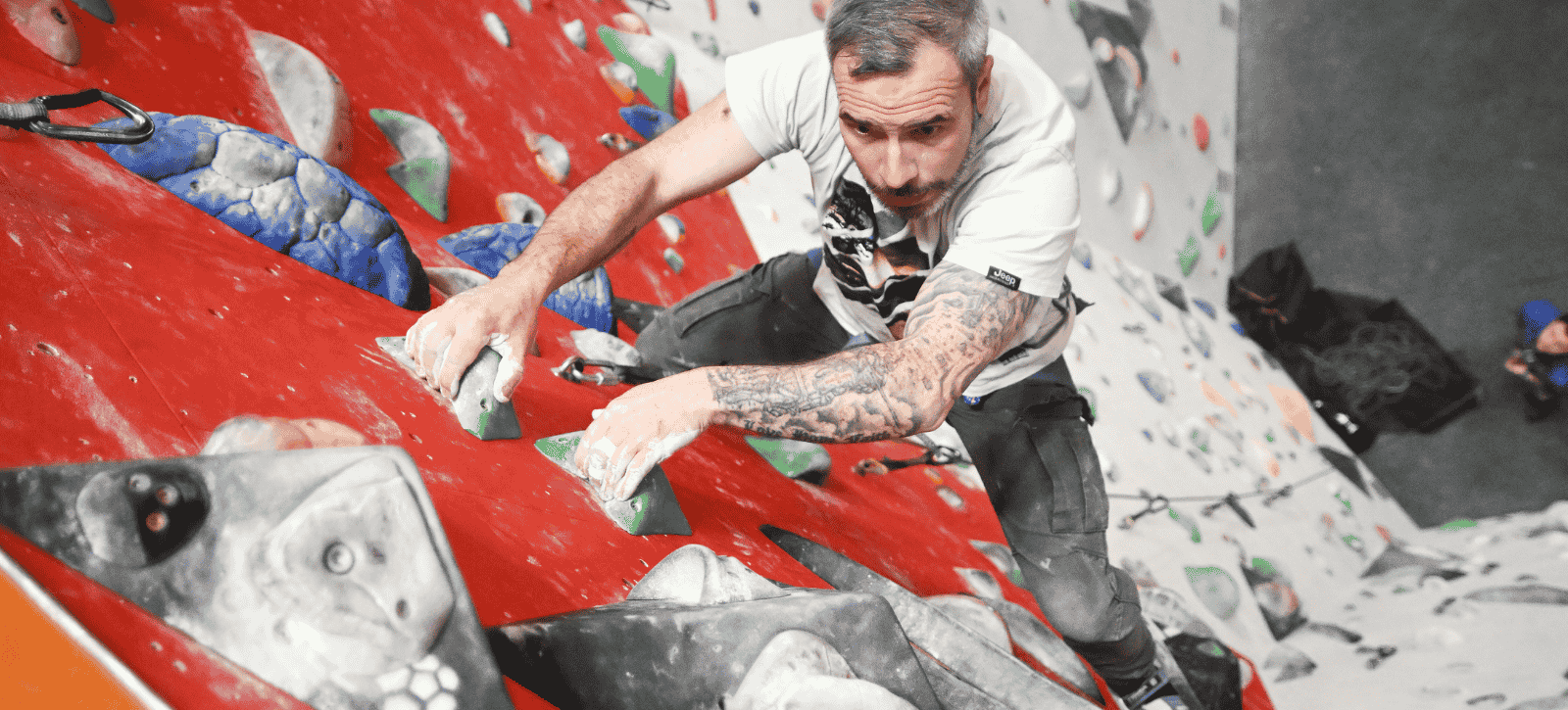 Gary is seen roped climbing from above