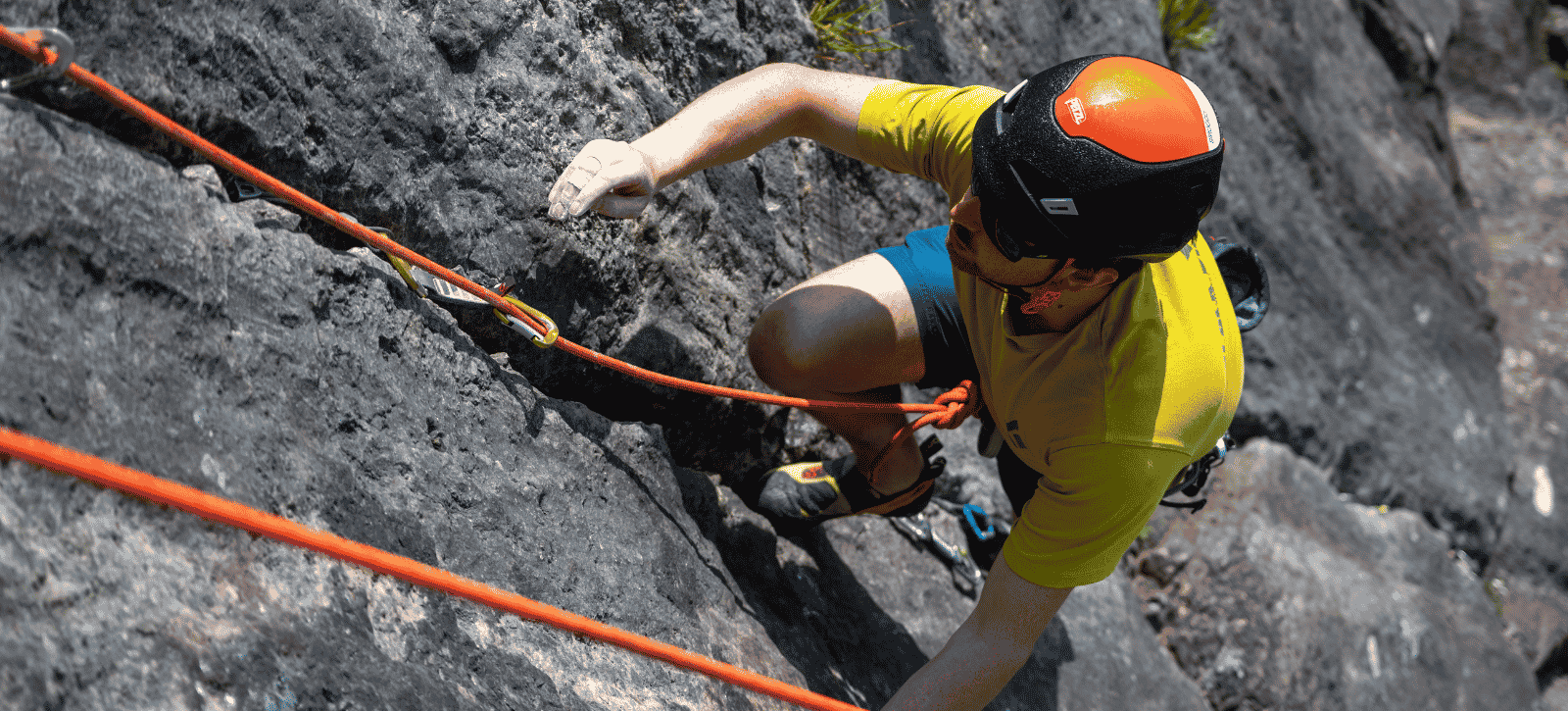 A climber on an outdoor trad route